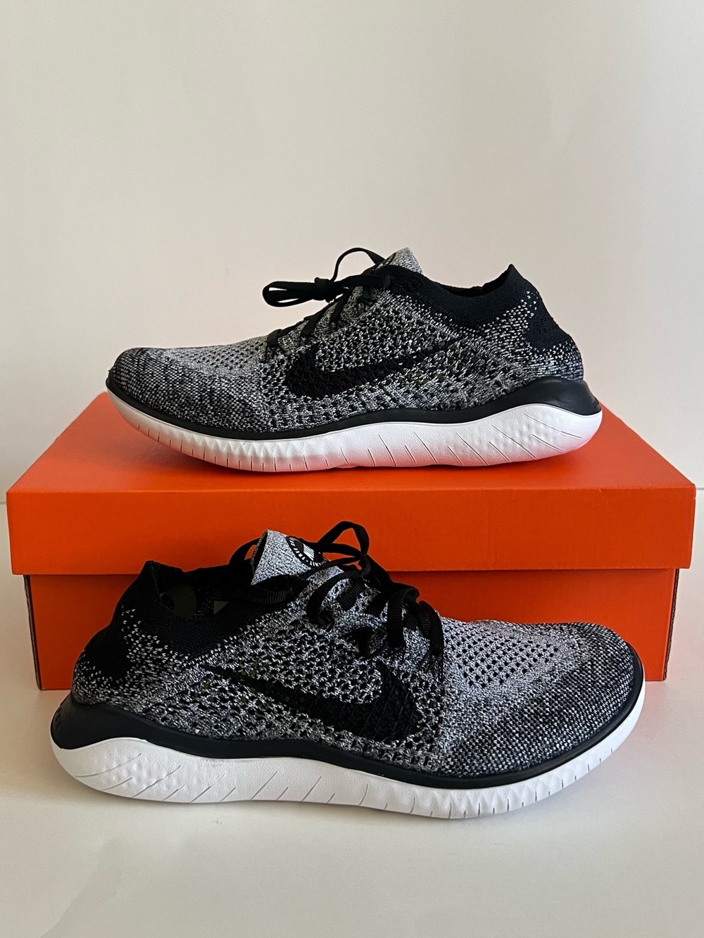 Nike Women's Black/White Flyknit Athletic Shoes